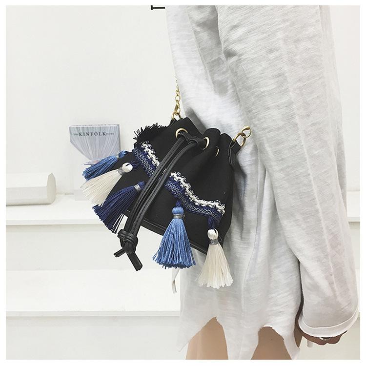 National Wind Mini Diagonal Canvas Bucket Bag