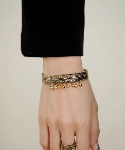 Vintage Ancient Gold Hollow Out Patchwork Tassel Cuff