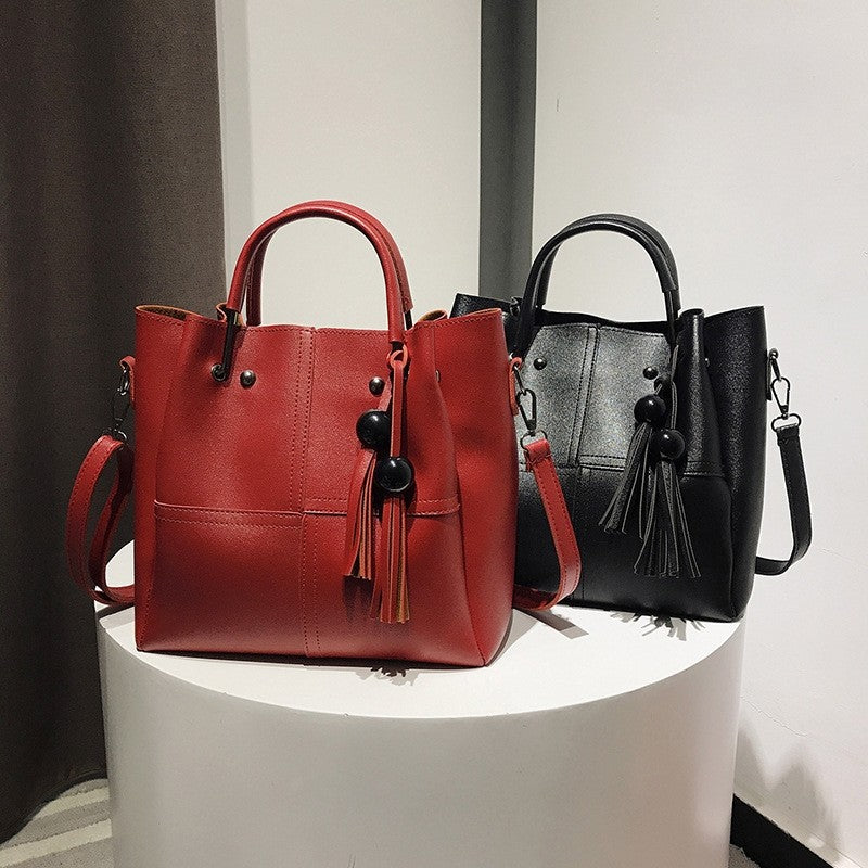 Three-Piece Bag With Tassels