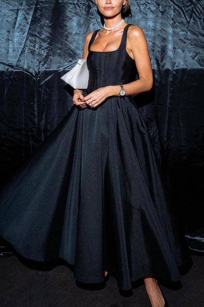 Off Shoulder Black Dress With Flowing Skirt
