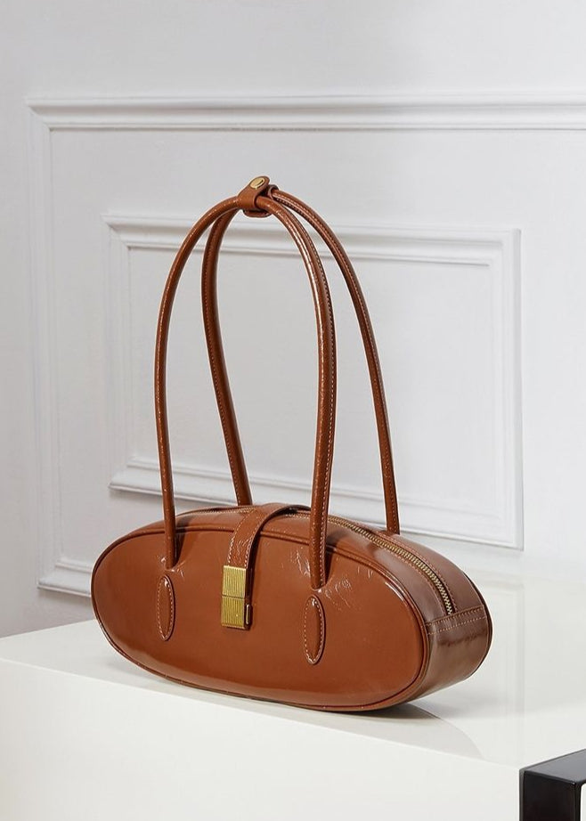 Oval Patent Leather Top Handle Structured Handbag