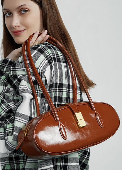 Oval Patent Leather Top Handle Structured Handbag
