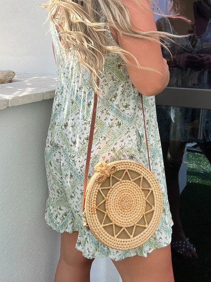 Round Rattan Bag With Sunburst Pattern