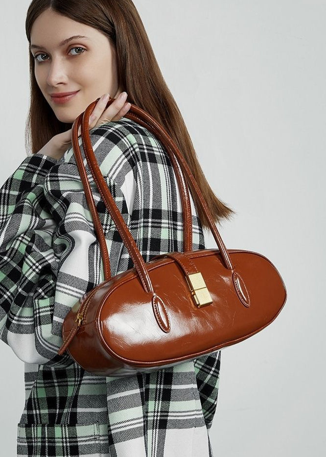 Oval Patent Leather Top Handle Structured Handbag