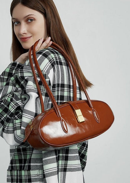 Oval Patent Leather Top Handle Structured Handbag