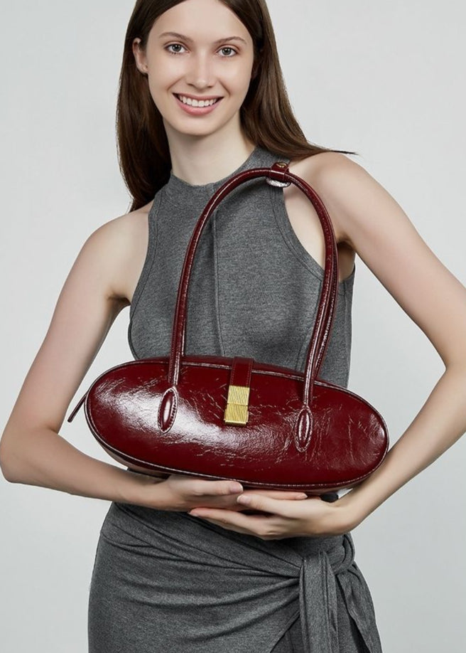Oval Patent Leather Top Handle Structured Handbag