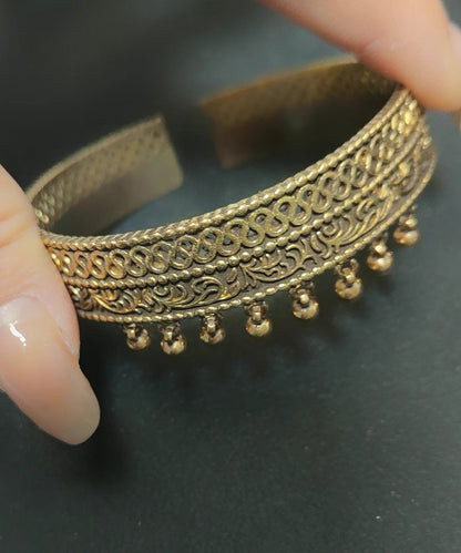Vintage Ancient Gold Hollow Out Patchwork Tassel Cuff