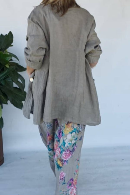 Set of green jacket and wide trousers with floral print