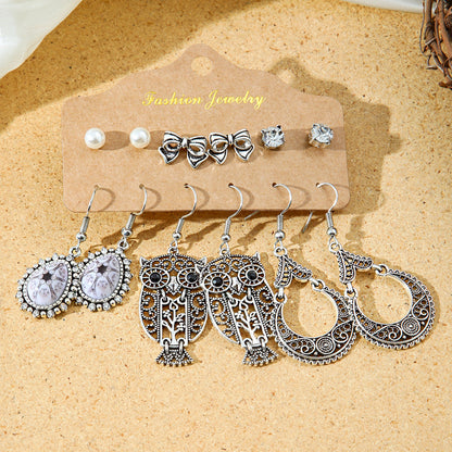 Bohemian Style Metal Earrings with Tassels and Geometric Shapes