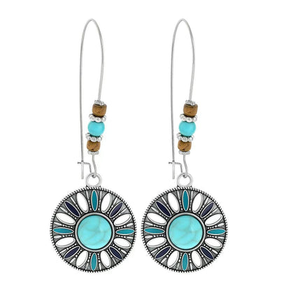 Turquoise Tassel Earrings with Geometric Metal Design