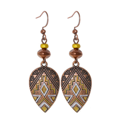 Bohemian Vintage Inspired Earrings with Feather and Tassel Elements