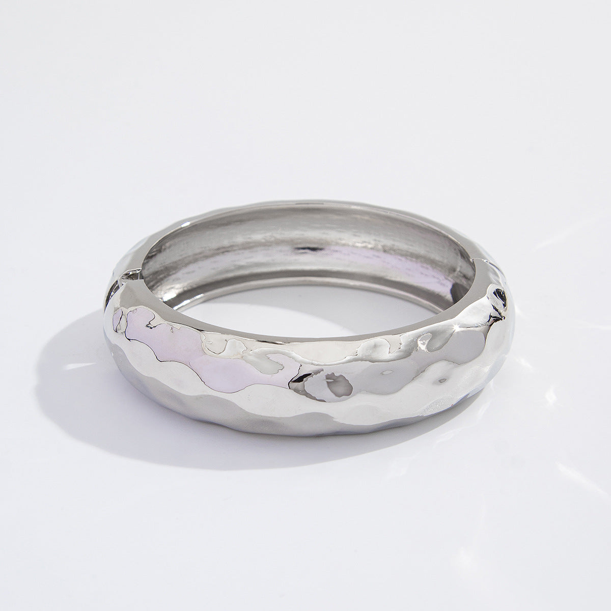 Fashionable Metal Leaf Spring Bracelet With Unique Wing Design