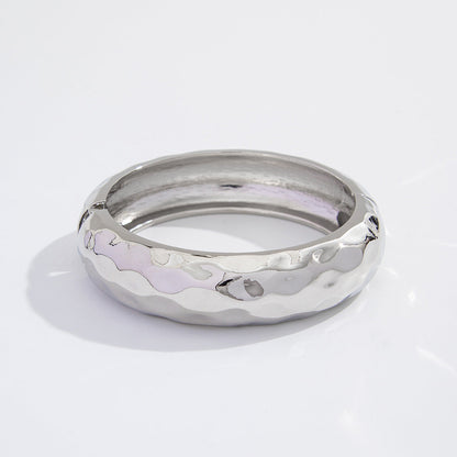 Fashionable Metal Leaf Spring Bracelet With Unique Wing Design