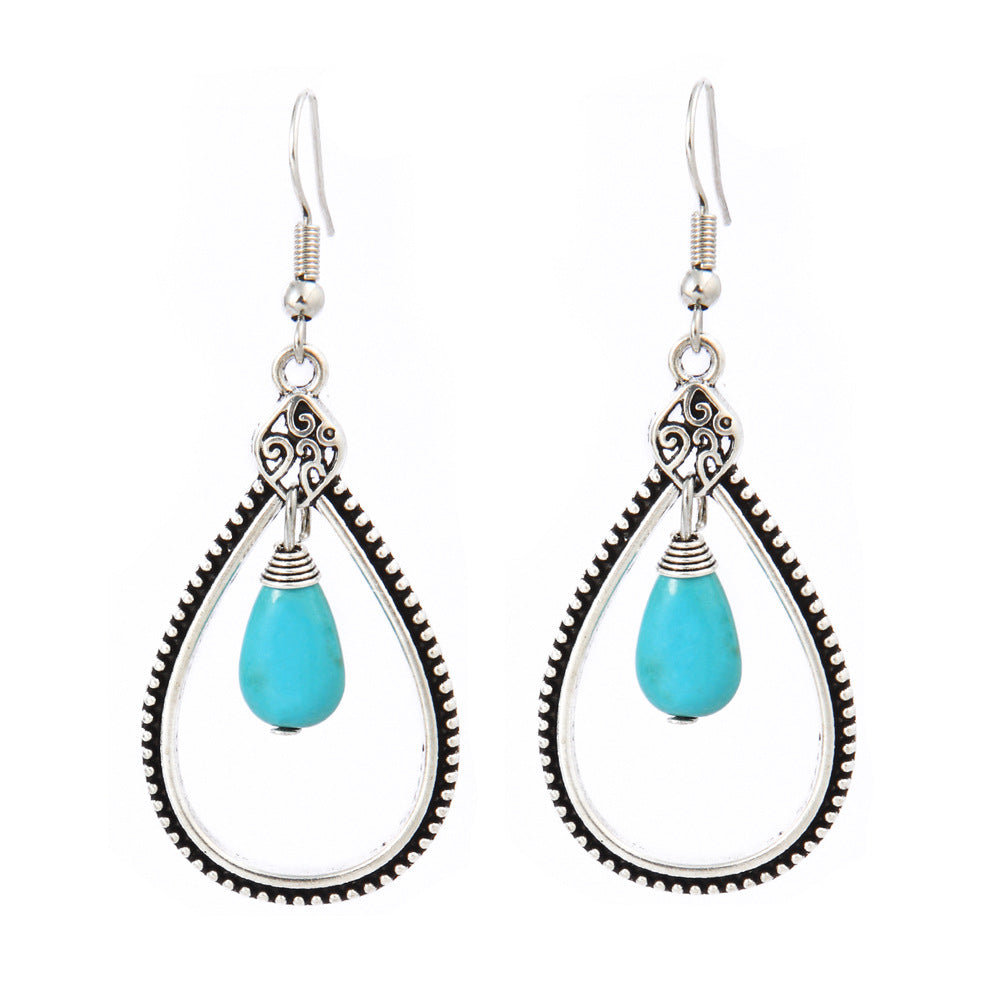 Turquoise Tassel Earrings with Geometric Metal Design