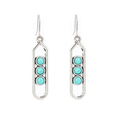 Turquoise Tassel Earrings with Geometric Metal Design
