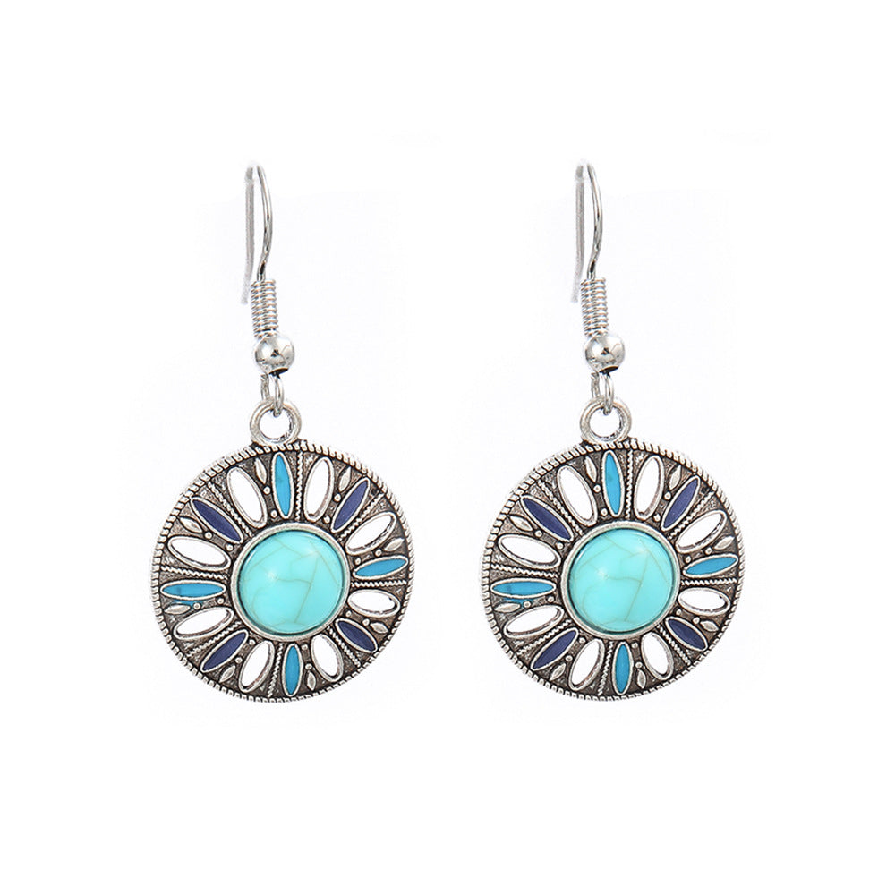 Turquoise Tassel Earrings with Geometric Metal Design