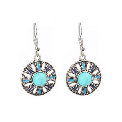 Turquoise Tassel Earrings with Geometric Metal Design