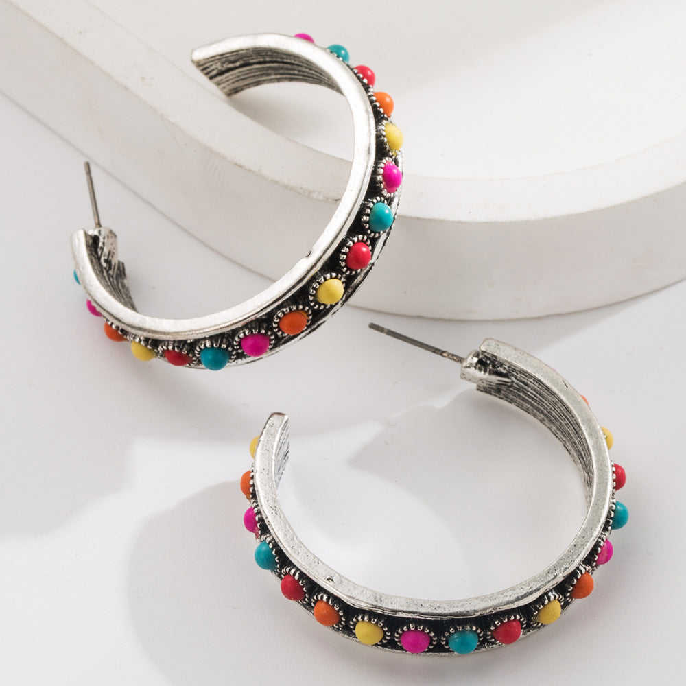 Exaggerated C-Shaped Earrings with Turquoise Accent