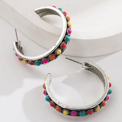 Exaggerated C-Shaped Earrings with Turquoise Accent