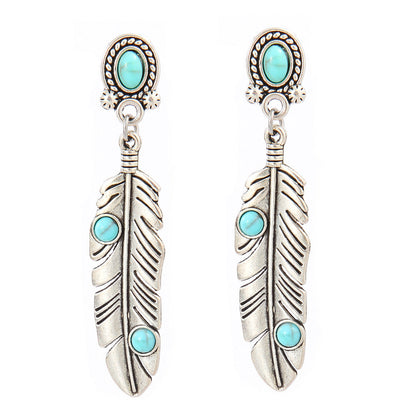 Turquoise Tassel Earrings with Geometric Metal Design