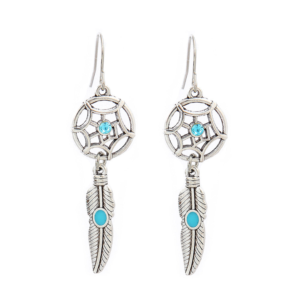 Turquoise Tassel Earrings with Geometric Metal Design