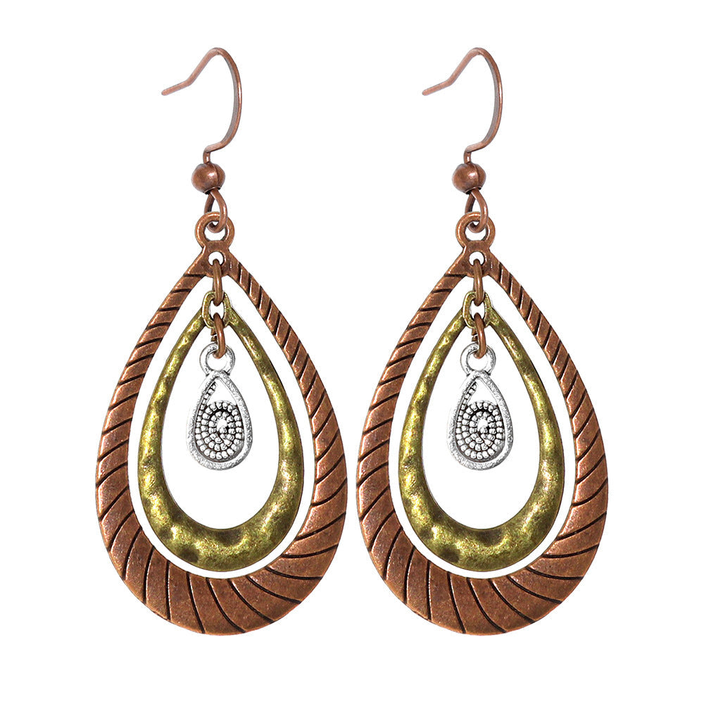 Bohemian Vintage Inspired Earrings with Feather and Tassel Elements