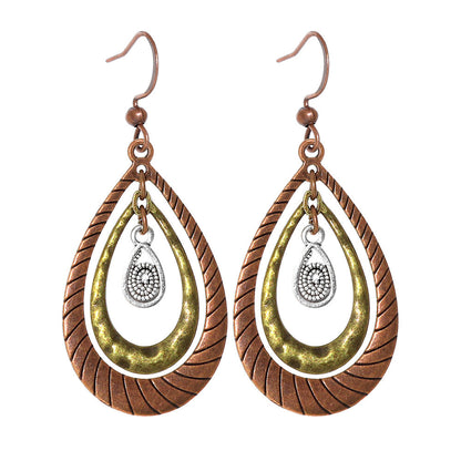 Bohemian Vintage Inspired Earrings with Feather and Tassel Elements