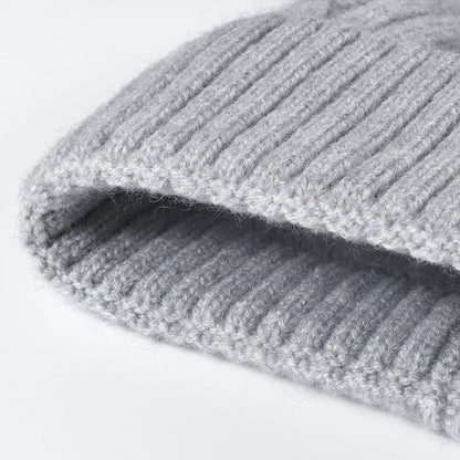 Splicing Twist Padded Knit Pom Beanie