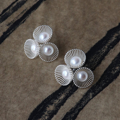 The Texture Of The Stud Earrings Touched My Pearl-Like Earrings