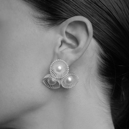 The Texture Of The Stud Earrings Touched My Pearl-Like Earrings