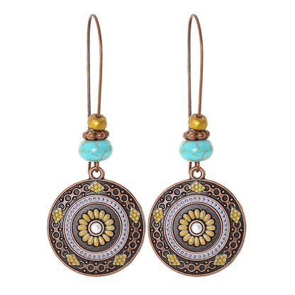 Bohemian Vintage Inspired Earrings with Feather and Tassel Elements