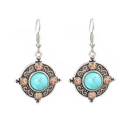 Turquoise Tassel Earrings with Geometric Metal Design