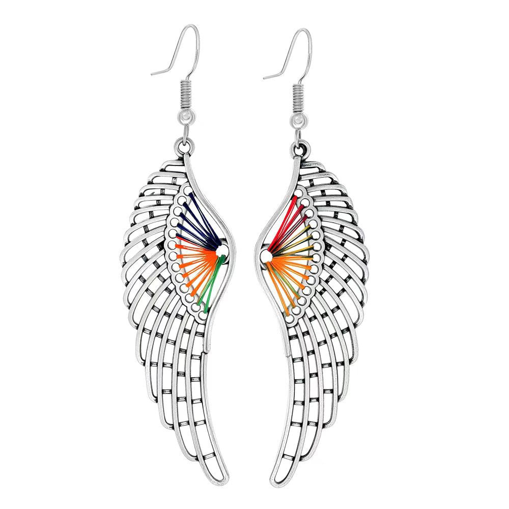 Turquoise Tassel Earrings with Geometric Metal Design