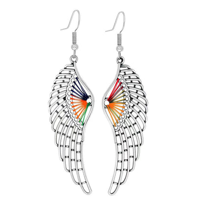 Turquoise Tassel Earrings with Geometric Metal Design