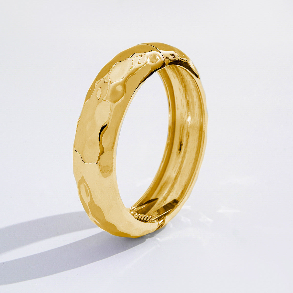 Fashionable Metal Leaf Spring Bracelet With Unique Wing Design