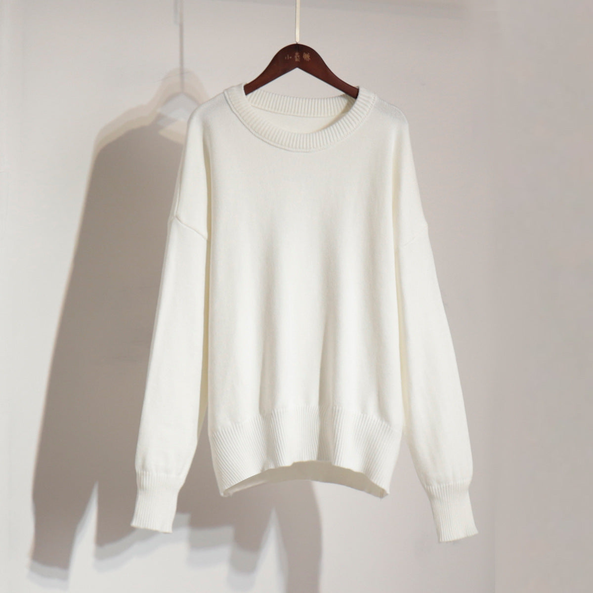 Classic Round Neck Sweater Solid Color Knit Top Casual Elegance