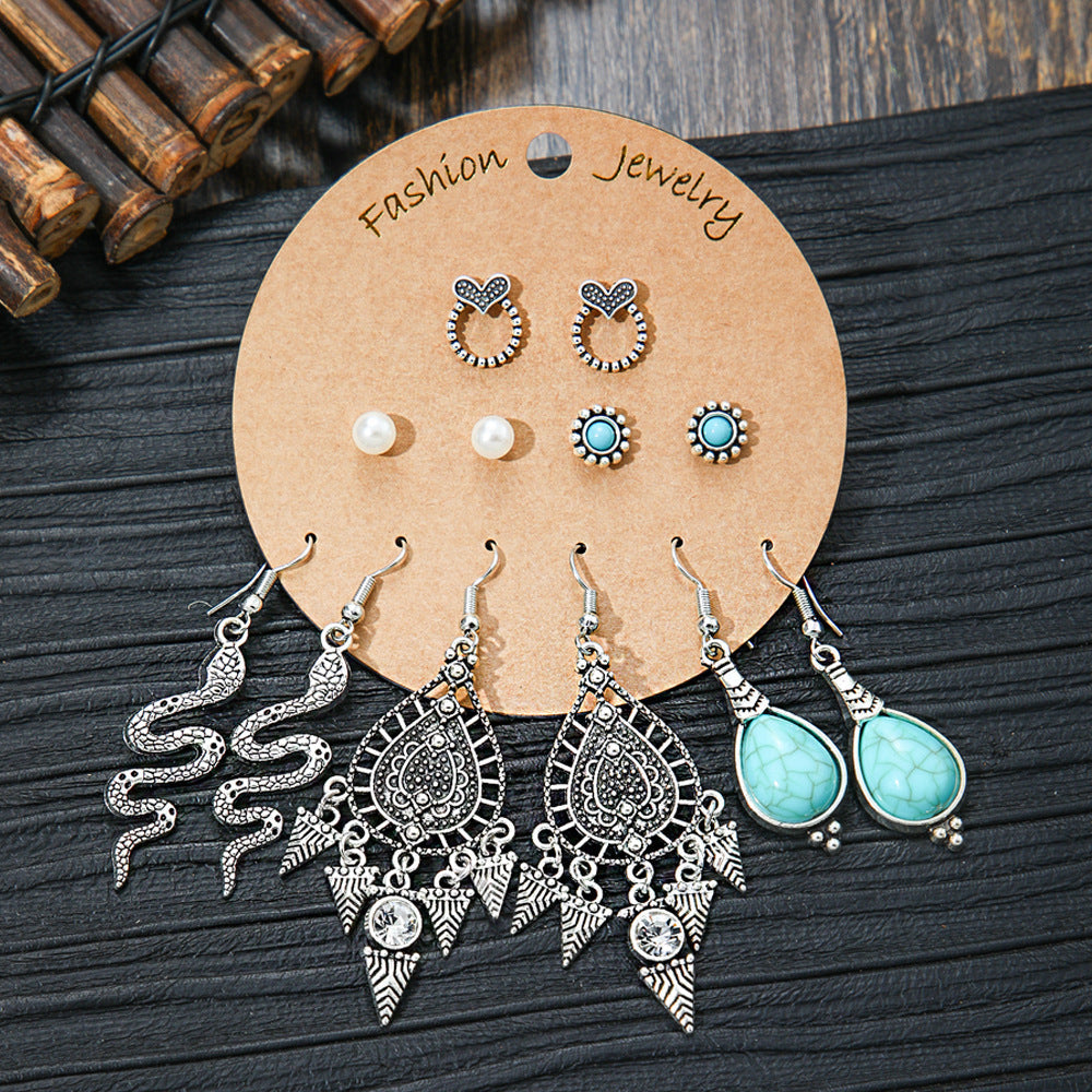 Bohemian Style Metal Earrings with Tassels and Geometric Shapes