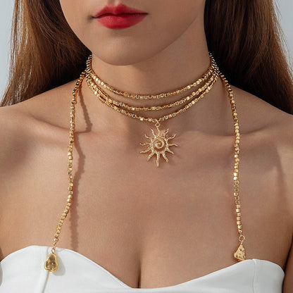 Long Layered Necklace With Diamond Accents And Geometric Pendants