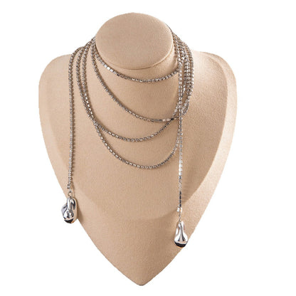 Long Layered Necklace With Diamond Accents And Geometric Pendants