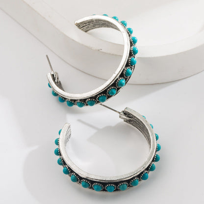 Exaggerated C-Shaped Earrings with Turquoise Accent