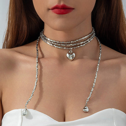 Long Layered Necklace With Diamond Accents And Geometric Pendants