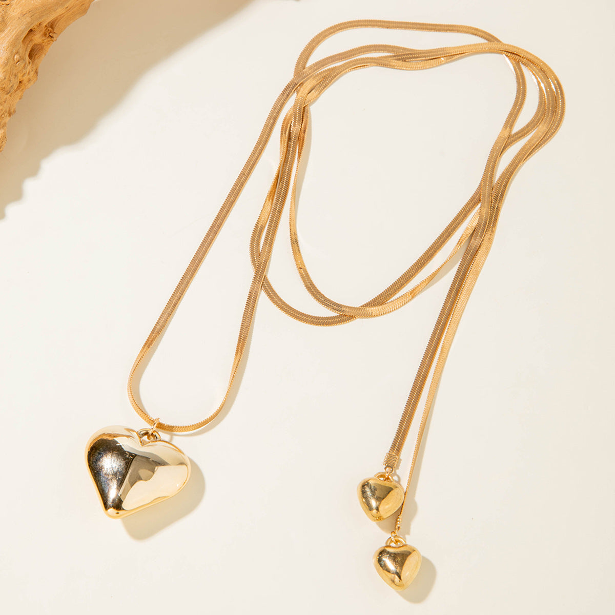 Long Layered Necklace With Diamond Accents And Geometric Pendants