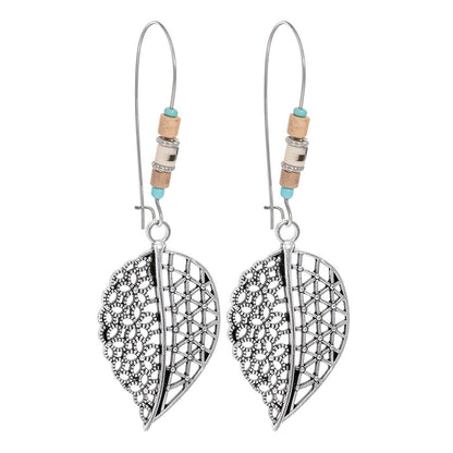 Turquoise Tassel Earrings with Geometric Metal Design