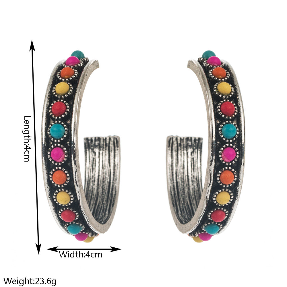 Exaggerated C-Shaped Earrings with Turquoise Accent