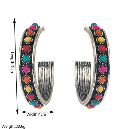 Exaggerated C-Shaped Earrings with Turquoise Accent