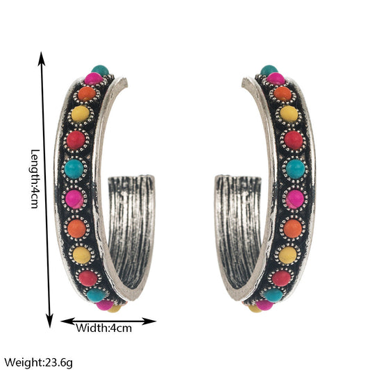 Exaggerated C-Shaped Earrings with Turquoise Accent