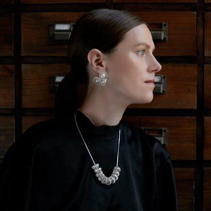 The Texture Of The Stud Earrings Touched My Pearl-Like Earrings