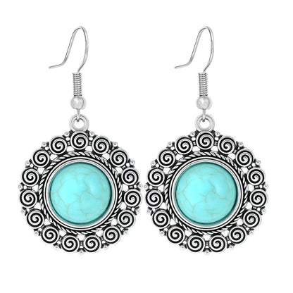 Turquoise Tassel Earrings with Geometric Metal Design