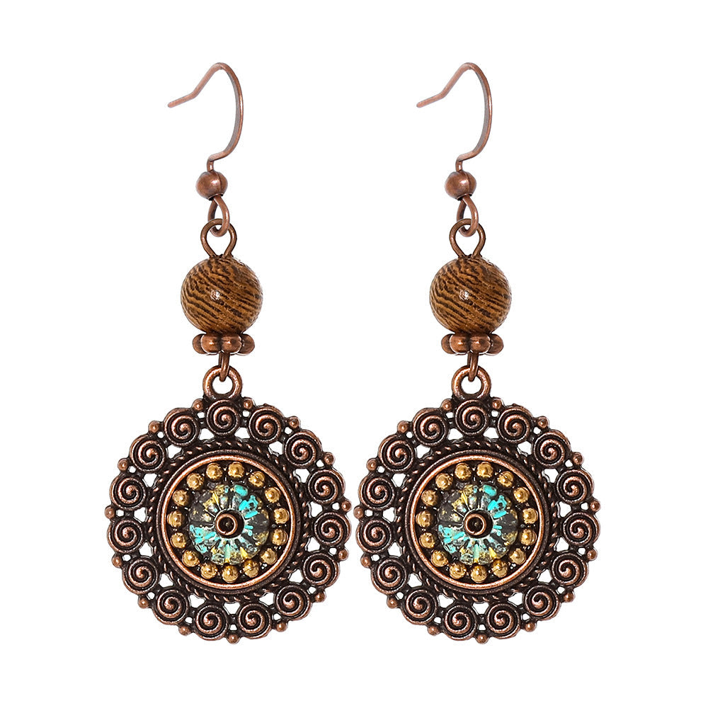 Bohemian Vintage Inspired Earrings with Feather and Tassel Elements