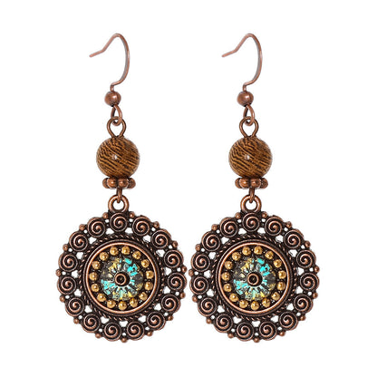 Bohemian Vintage Inspired Earrings with Feather and Tassel Elements